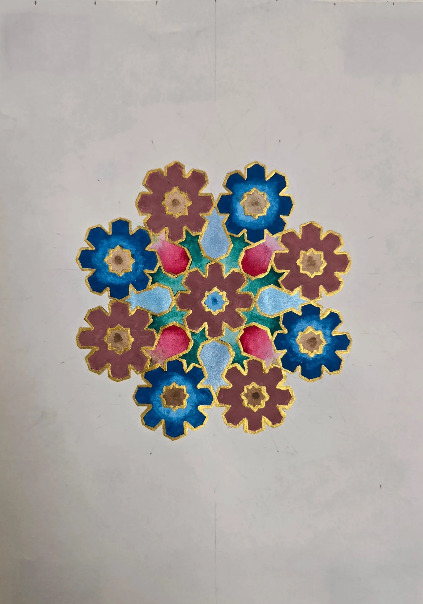 Eightfold floral geometry in blue, burgundy, teal and pink, outlined in gold on cream paper.